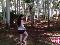 Solo teen fondling her pussy outdoors
