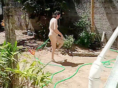Nudist Housewife Taking Bath In Front Yard