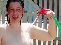 Nudist Housewife Taking Bath In Front Yard