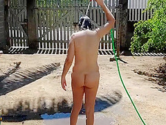 Nudist Housewife Taking Bath In Front Yard