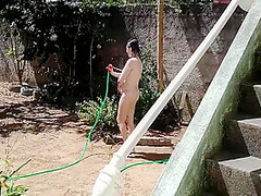 Nudist Housewife Taking Bath In Front Yard