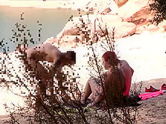 Couple Threesome In A Nudist Beach