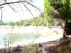 Couple Threesome In A Nudist Beach