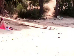 Couple Threesome In A Nudist Beach