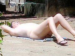 Wife Takes A Sunbath And Displays Her Nude Body To Delivery Man