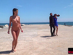 Perky boobed attractive babe walks outdoor naked on beach