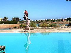 Stretching Eroticlly Outside Near The Pool - Watch4Fetish