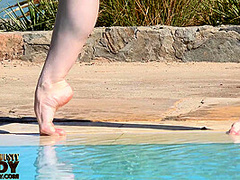 Stretching Eroticlly Outside Near The Pool - Watch4Fetish
