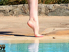 Stretching Eroticlly Outside Near The Pool - Watch4Fetish