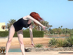 Stretching Eroticlly Outside Near The Pool - Watch4Fetish