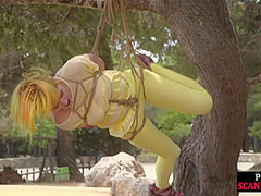 Femsub used in public suspension bondage with spanking