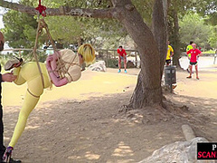 Femsub used in public suspension bondage with spanking