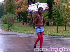 Petite teen solo rubs her pussy