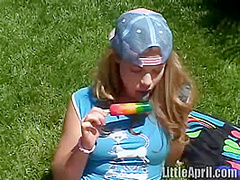 Teen rubbing her clit outdoors
