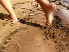 Girl On The Wild Beach