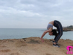 Contortionist Bends Outdoor At The Lake - Watch4Fetish