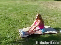 Wet teen Little April fingers her pussy