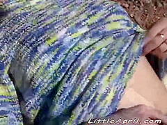 Little April goes outdoors to masturbate
