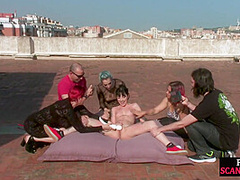 BDSM teen enjoys outdoor pussy and body torment from group