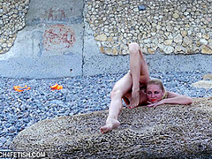 Naked And Flexible On The Beach - Watch4Fetish