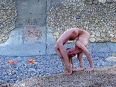 Naked And Flexible On The Beach - Watch4Fetish