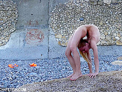 Naked And Flexible On The Beach - Watch4Fetish