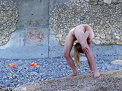Naked And Flexible On The Beach - Watch4Fetish