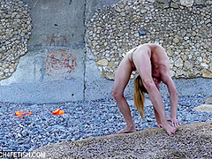 Naked And Flexible On The Beach - Watch4Fetish
