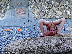 Naked And Flexible On The Beach - Watch4Fetish