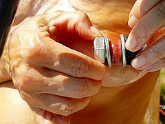 Nippleringlover Horny Milf Masturbating Outdoors In Pool Inserting Huge Screws In Extreme Stretched Pierced Nipples