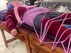 Wool Mohair Layers Of Sweaters On A Bondage Table