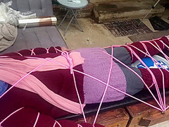Wool Mohair Layers Of Sweaters On A Bondage Table