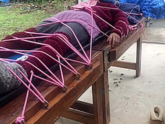 Wool Mohair Layers Of Sweaters On A Bondage Table
