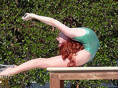 Girl In A Green Bodysuit Suit - Watch4Fetish