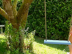 Mature Lady In Garden