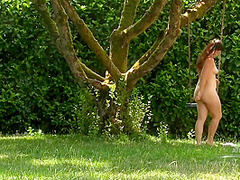 Mature Lady In Garden