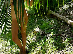 A Naked Girl Is Photographed In The Wild Jungle Of