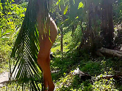 A Naked Girl Is Photographed In The Wild Jungle Of