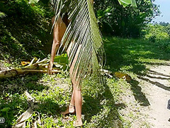 A Naked Girl Is Photographed In The Wild Jungle Of