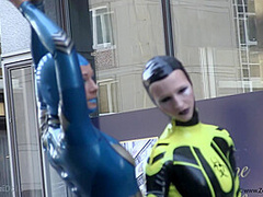 Through The City In A Tight Latex Costume - Watch4Fetish