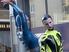 Through The City In A Tight Latex Costume - Watch4Fetish