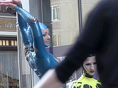 Through The City In A Tight Latex Costume - Watch4Fetish