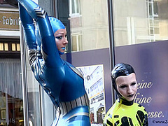 Through The City In A Tight Latex Costume - Watch4Fetish