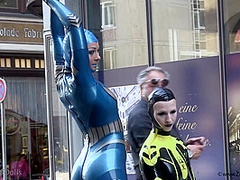 Through The City In A Tight Latex Costume - Watch4Fetish