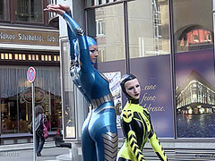 Through The City In A Tight Latex Costume - Watch4Fetish