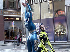 Through The City In A Tight Latex Costume - Watch4Fetish