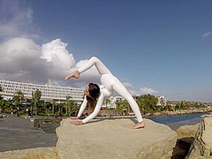 Elegnant Contortionist In White Spandex - Watch4Fetish