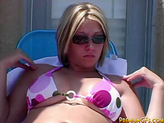 Hot Blonde rubbing big tits outdoor