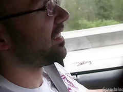 Hot Babe rubbing a cock while the guy driving caught on tape
