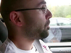 Hot Babe rubbing a cock while the guy driving caught on tape